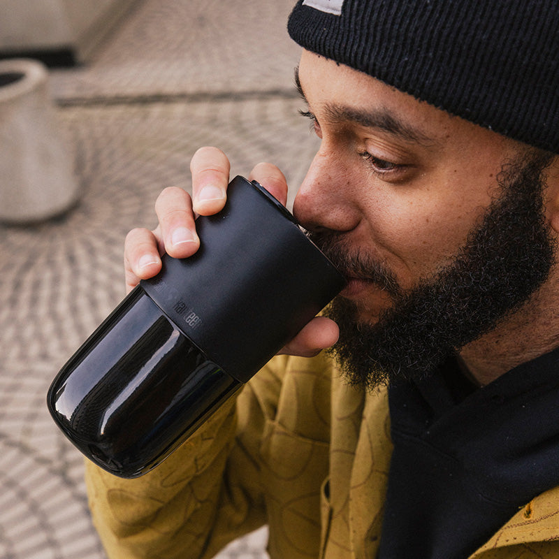 16oz-rise-tumbler-c1 16oz_rise_tumbler_black_man_drink_square.jpg