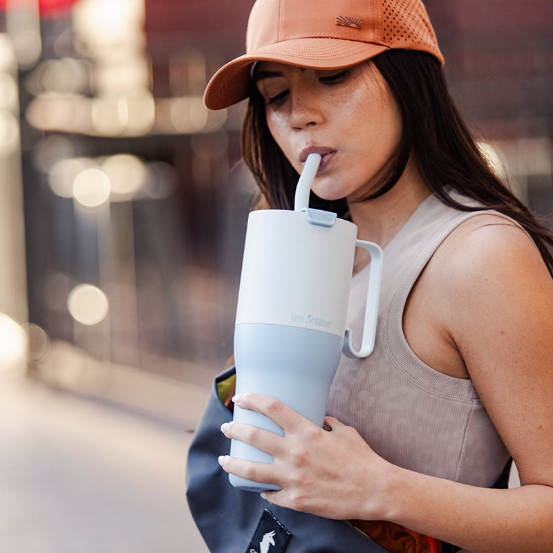 36oz-rise-tumbler-with-straw-lid-i2 36oz_rise_tumbler_straw_girl_sip_square.jpg
