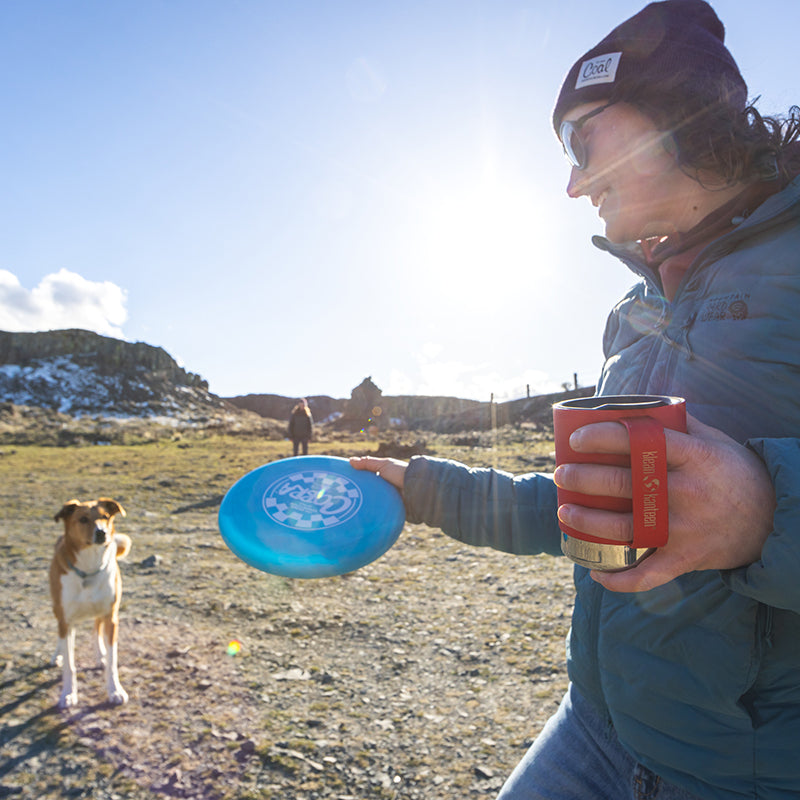 12oz-camp-mug-o5 insulated_camp_mug_12oz_woman_dog_frisbee_square.jpg
