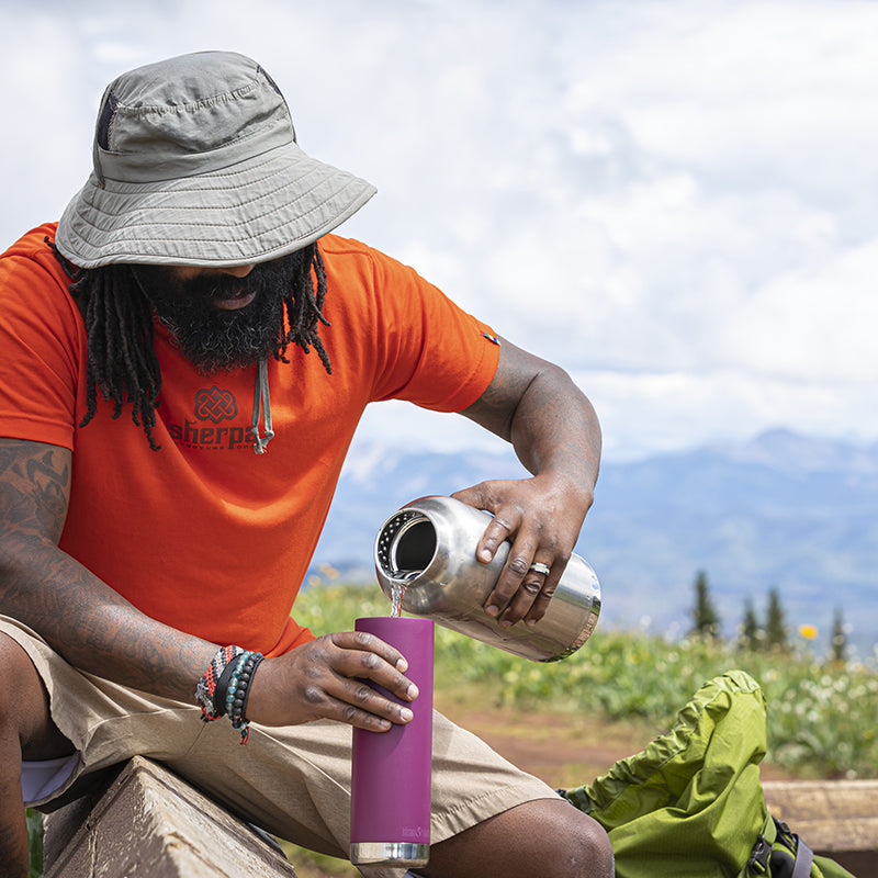 64oz-tkwide-with-loop-cap-w6 tkwide_64oz_bottle_backpacker_mountains_filling_square.jpg