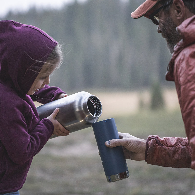 64oz-tkwide-with-loop-cap-w6 tkwide_64oz_bottle_girl_dad_filling_square.jpg